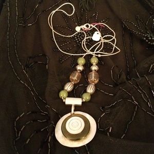 Silver and jade necklace.